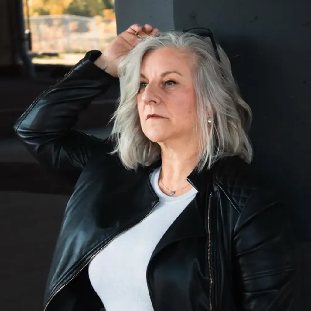 Face framing layers with bright silver front pieces in gray hair